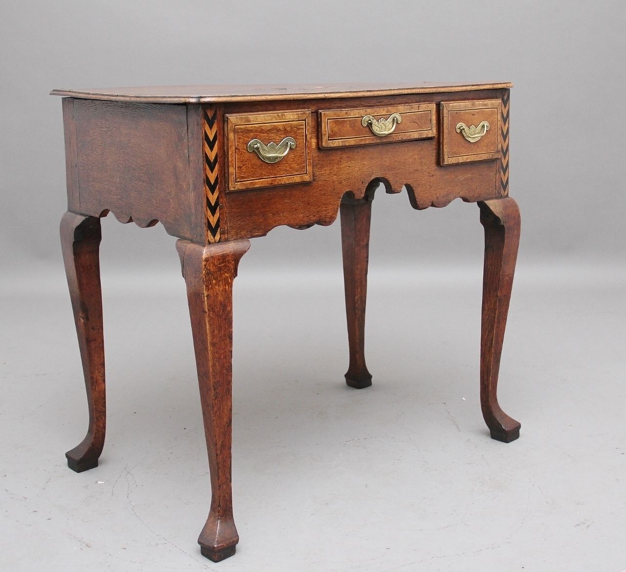 1750.0 A Decorative 18th Century Oak Lowboy photo