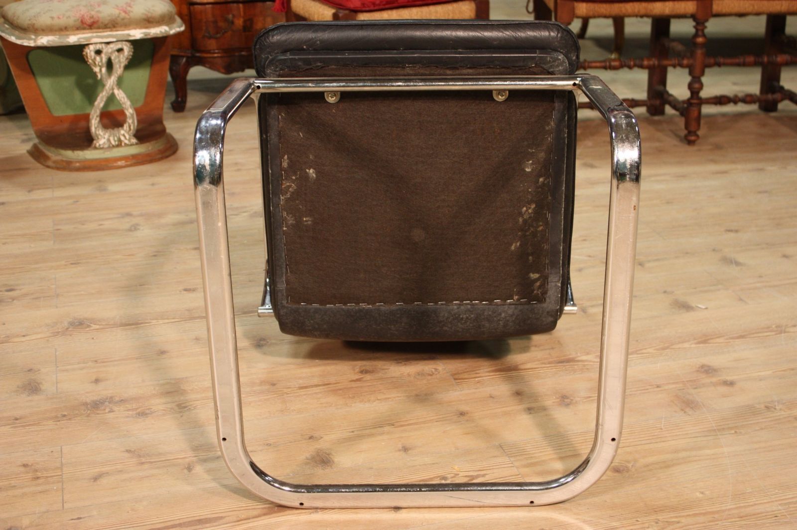 Designer Armchair In Plastic And Fake Leather photo vintage