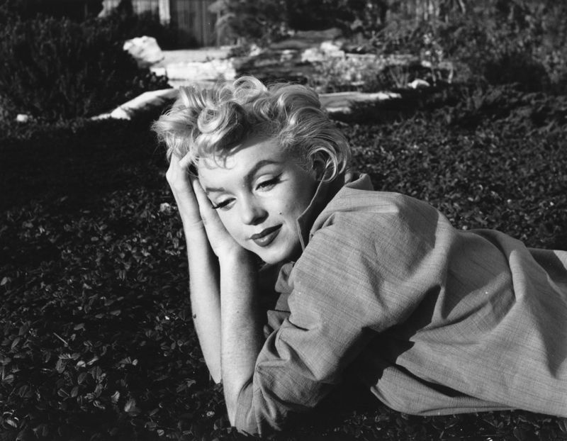'A Wistful Marilyn Monroe' 1954 Silver Gelatin Print Framed In White photo furniture