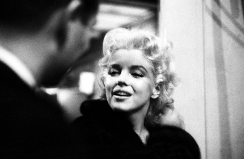 'Marilyn Takes It To The Streets' Marilyn Monroe 1955 Silver Gelatin Print Framed In White photo furniture