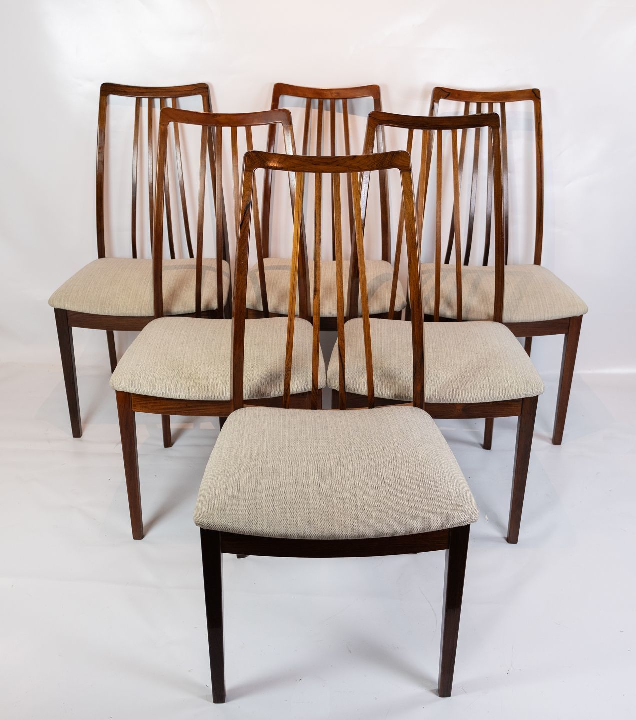Set Of Six Dining Chairs In Rosewood Upholstered With Light Wool Fabric Of Danish Design From The 1960s.