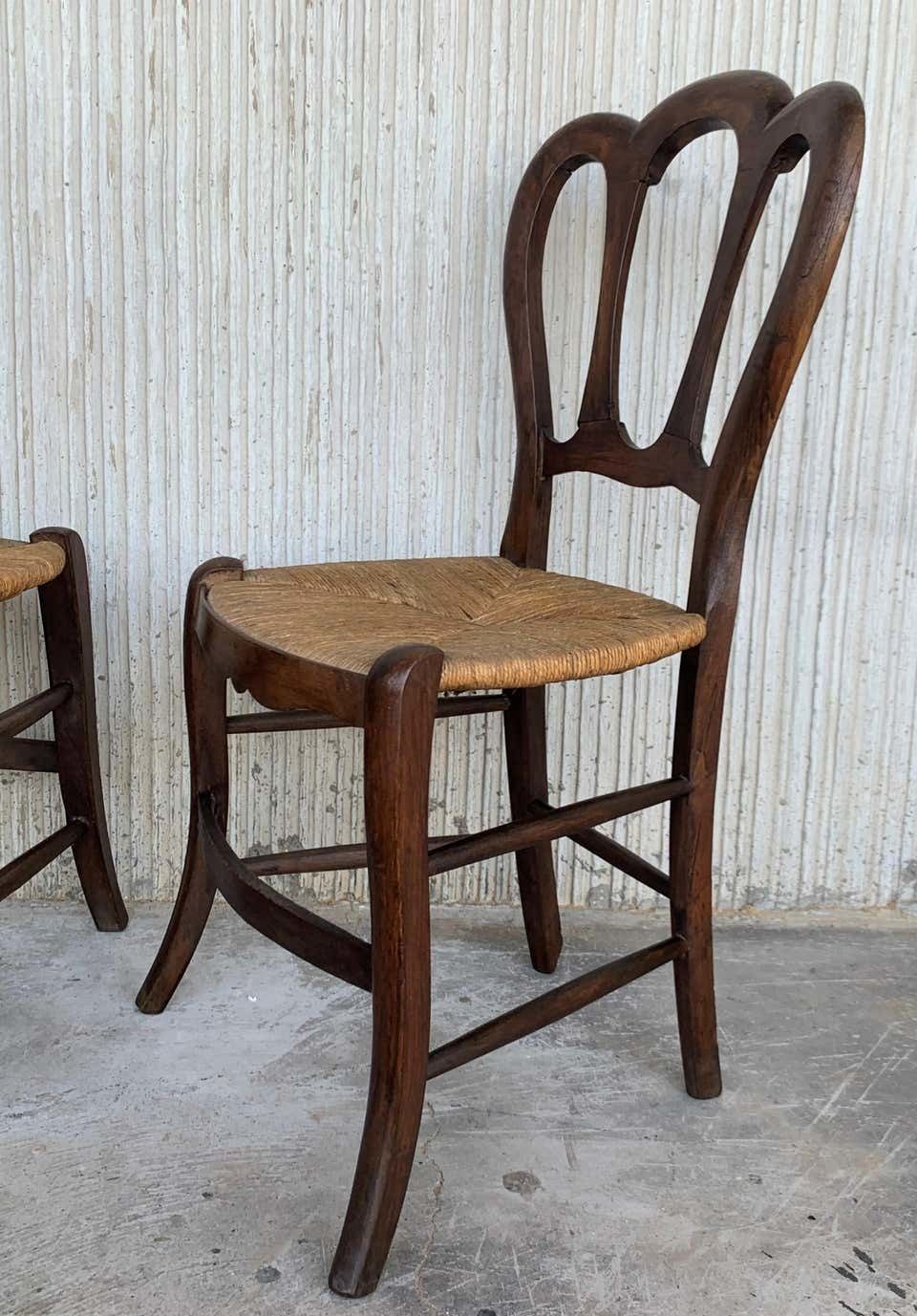 5102.0 Ensemble de cinq pièces : un banc et quatre chaises victoriennes, bois et rotin, XXe siècle photo