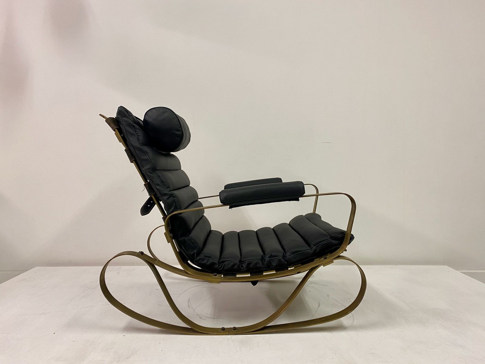 photo furniture 1970s Italian Brass And Black Leather Rocking Chair By Luciano Frigerio