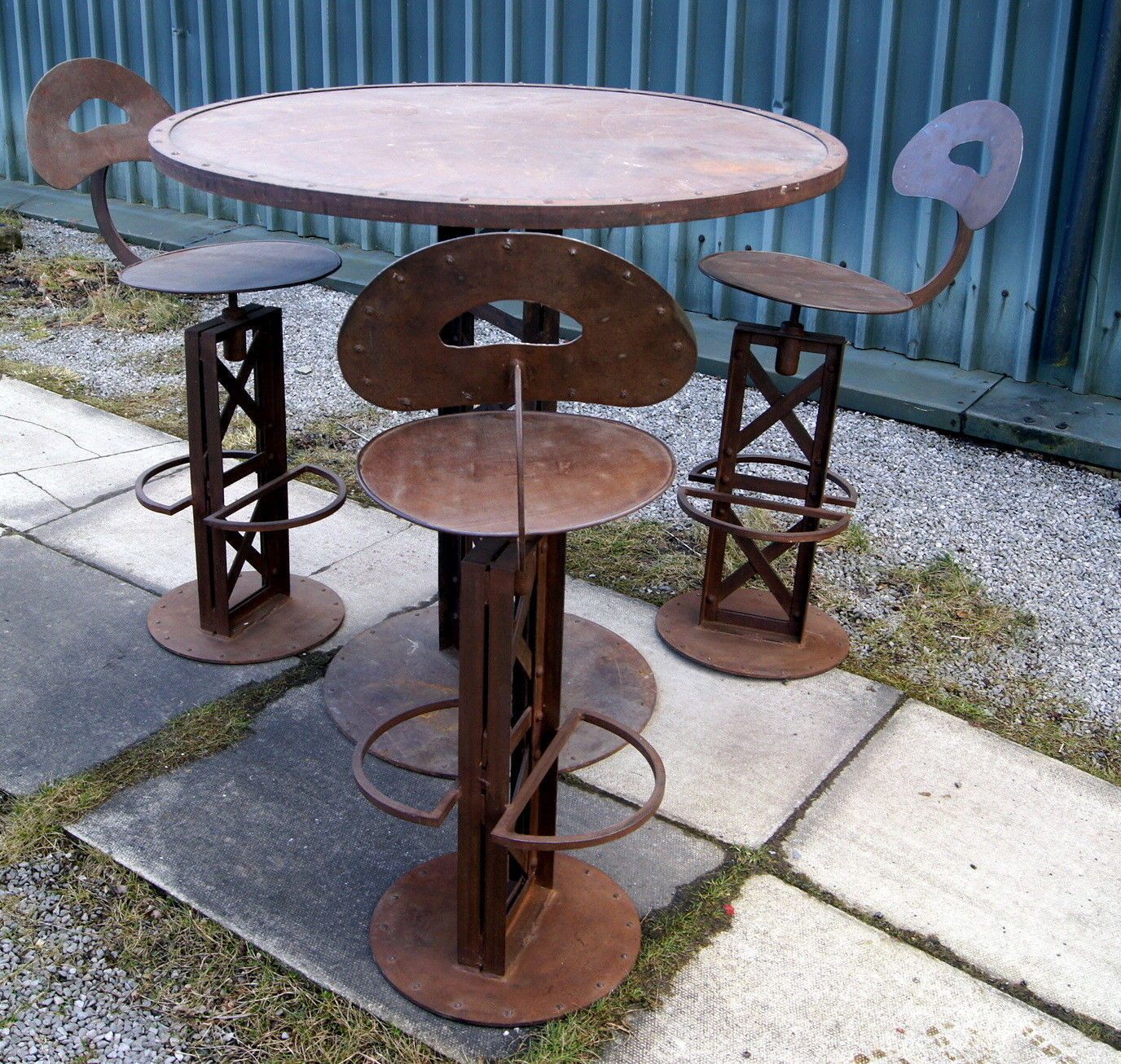 An Antique Industrial French Bistro Table And Chairs