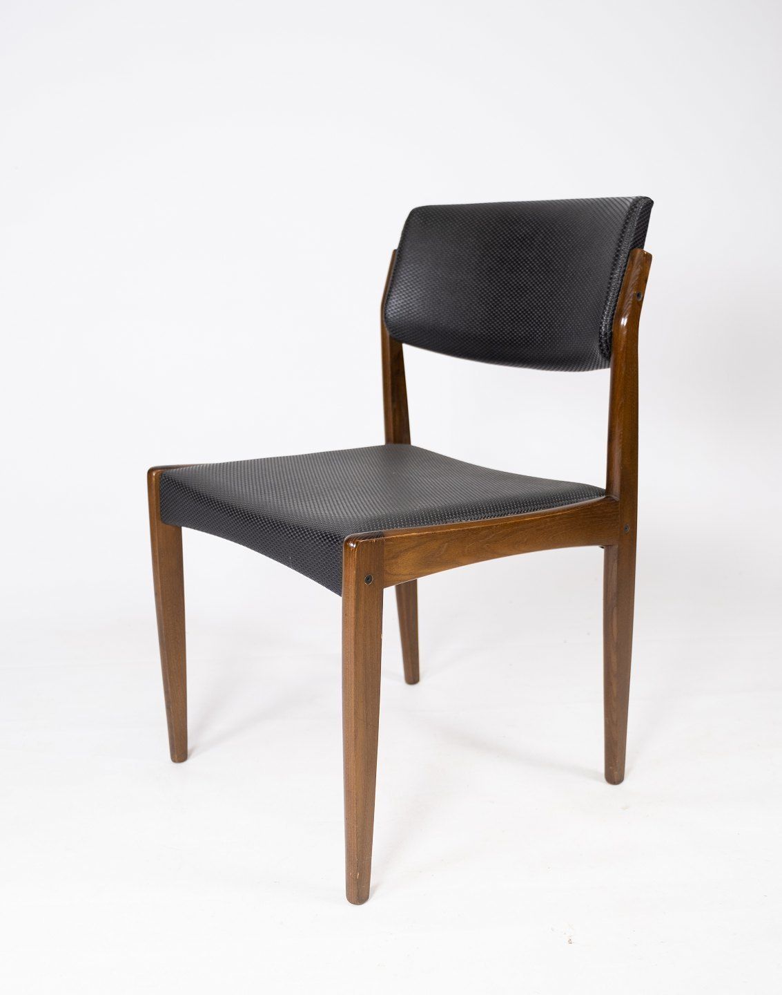 Set Of Four Dining Chairs Of Black Upholstery And Dark Wood Of Danish Design From The 1960s. photo for sale