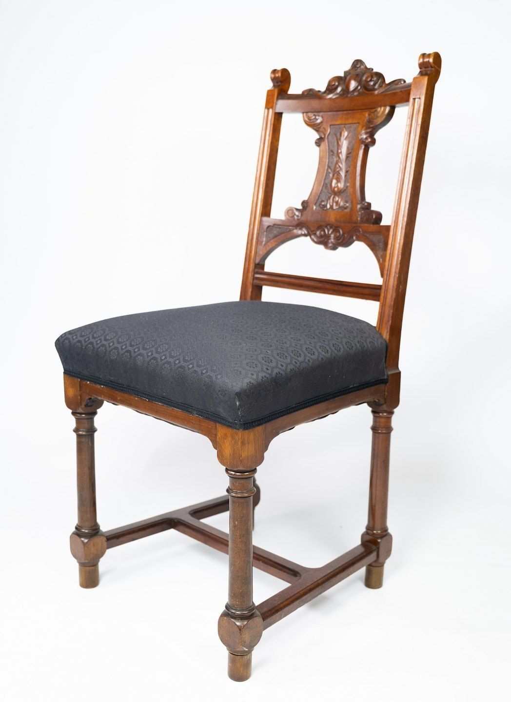 Set Of Four Dining Room Chairs In Walnut And Newly Upholstered With Black Fabric, From The 1890s. photo for sale
