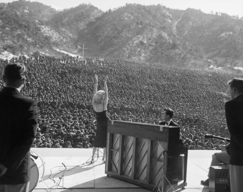 'Marilyn Monroe In Korea' 1954 Archival Pigment Print Framed In Black photo furniture