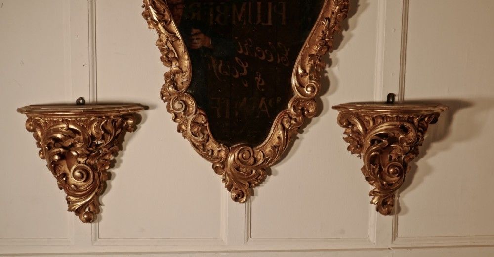 2100.0 Large 19th Century French Rococo Gilt Console Mirror And Wall Brackets Set photo