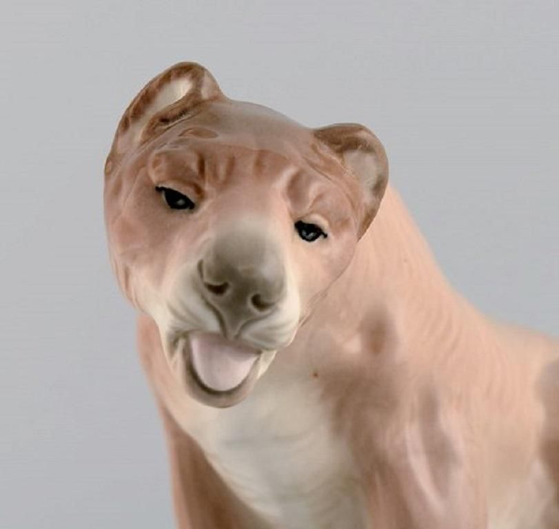 Amphora, Czechoslovakia, Hand Painted Porcelain Figurine Of Lioness On Rock photo for sale