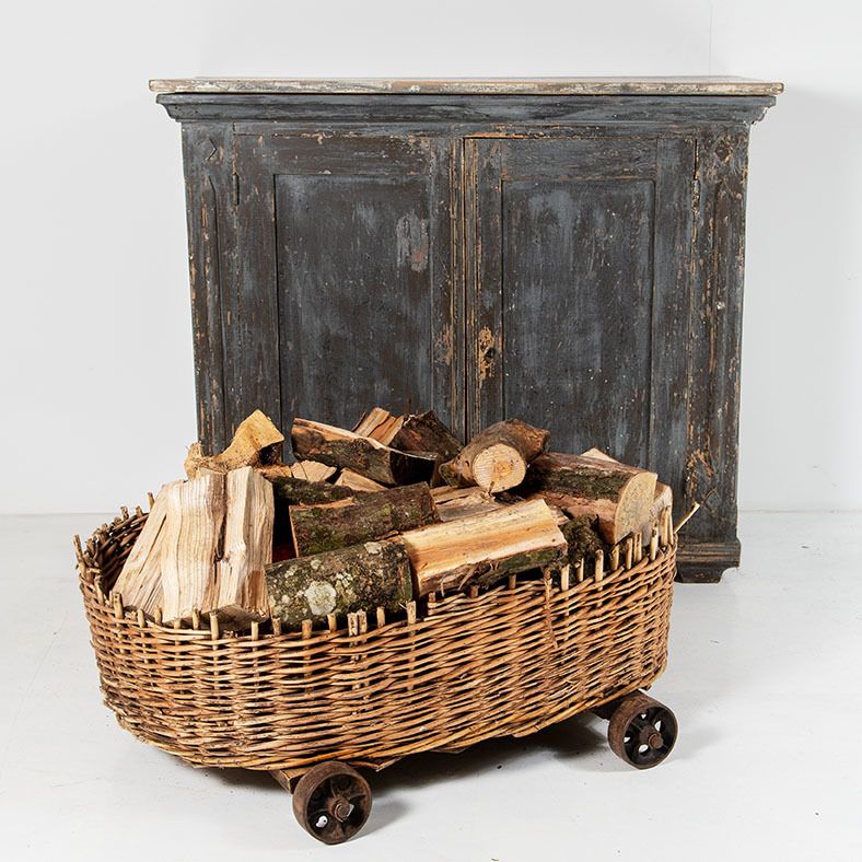 Large Wicker Dog Bed Or Log Basket On Cast Iron Wheels photo furniture