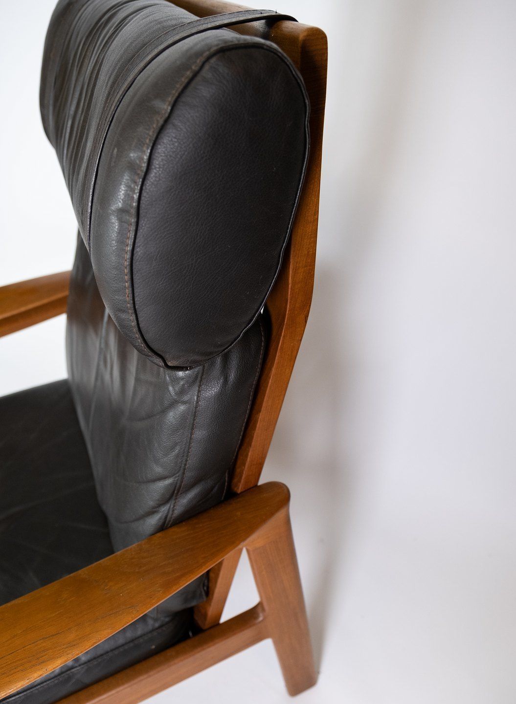 Armchair And Stool In Teak Upholstered With Black Leather Designed By Arne Vodder And Manufactured By Komfort In The 1960s. photo vinterior