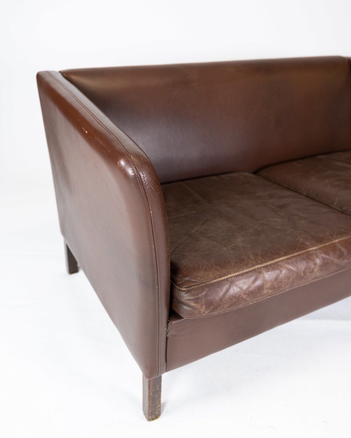 Two Person Sofa Upholstered With Dark Brown Leather Of Danish Design Made By Stouby Møbelfabrik From The 1960s. photo furniture