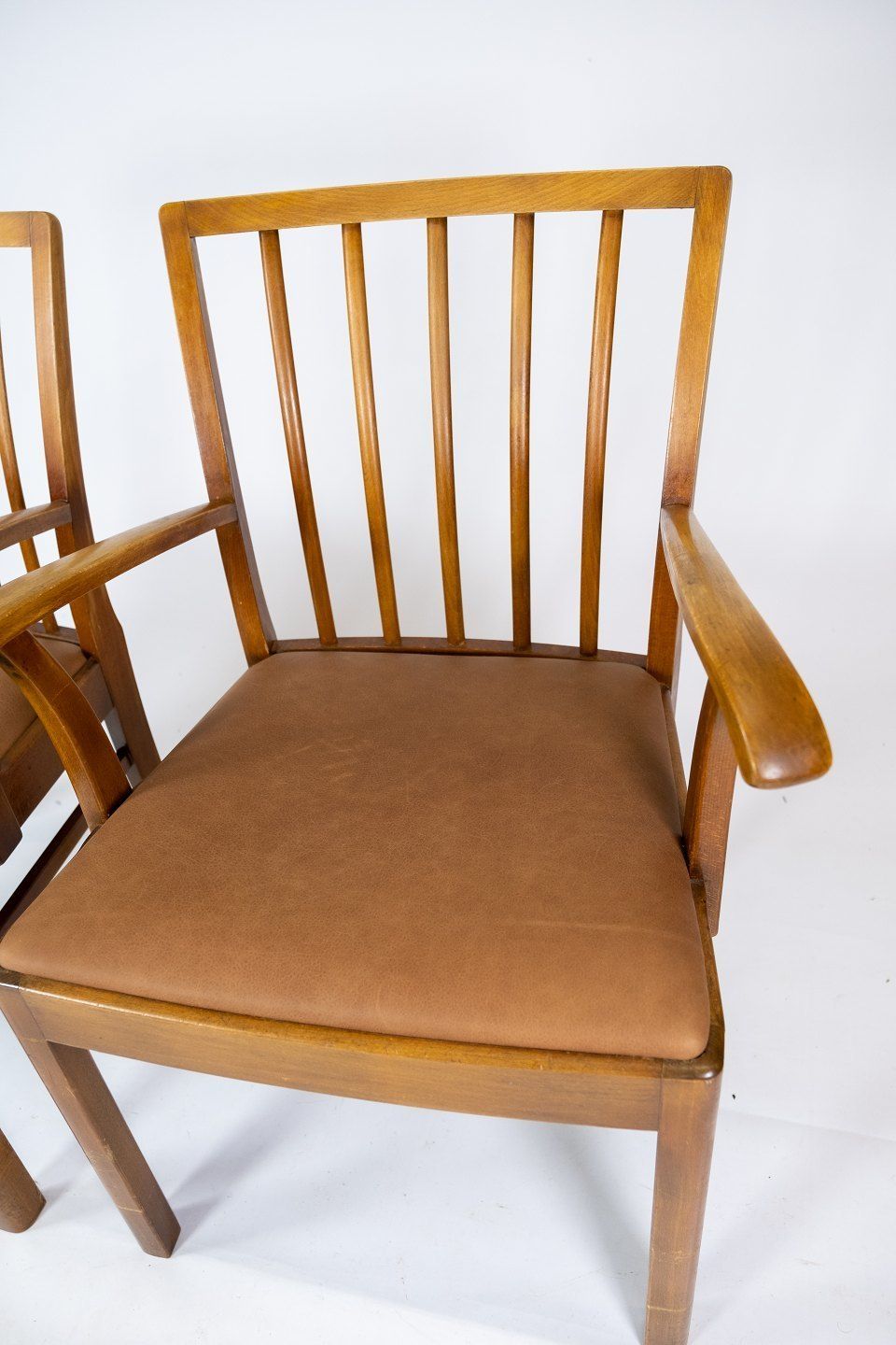 Set Of Two Armchairs In Light Wood And Upholstered With Light Brown Leather By A Danish Master Carpenter From The 1940s. photo furniture