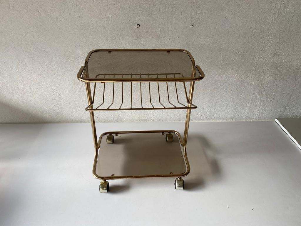 Mid Century Modern Gold Metal And Smoked Glass Magazine Stand Table, Living Room Organiser, 1960s, photo for sale