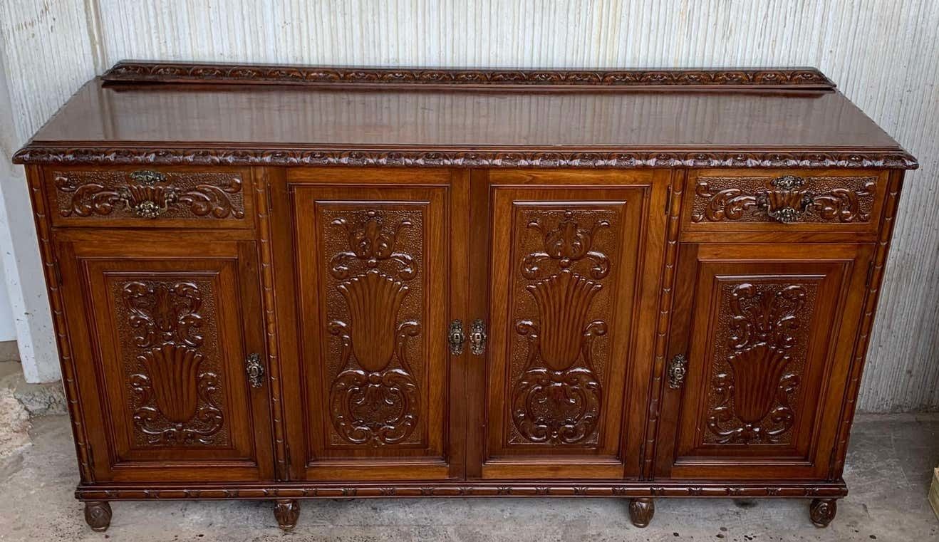 Early 20th Carved Walnut Sideboard With Four Doors And Two Drawers And Crest photo for sale