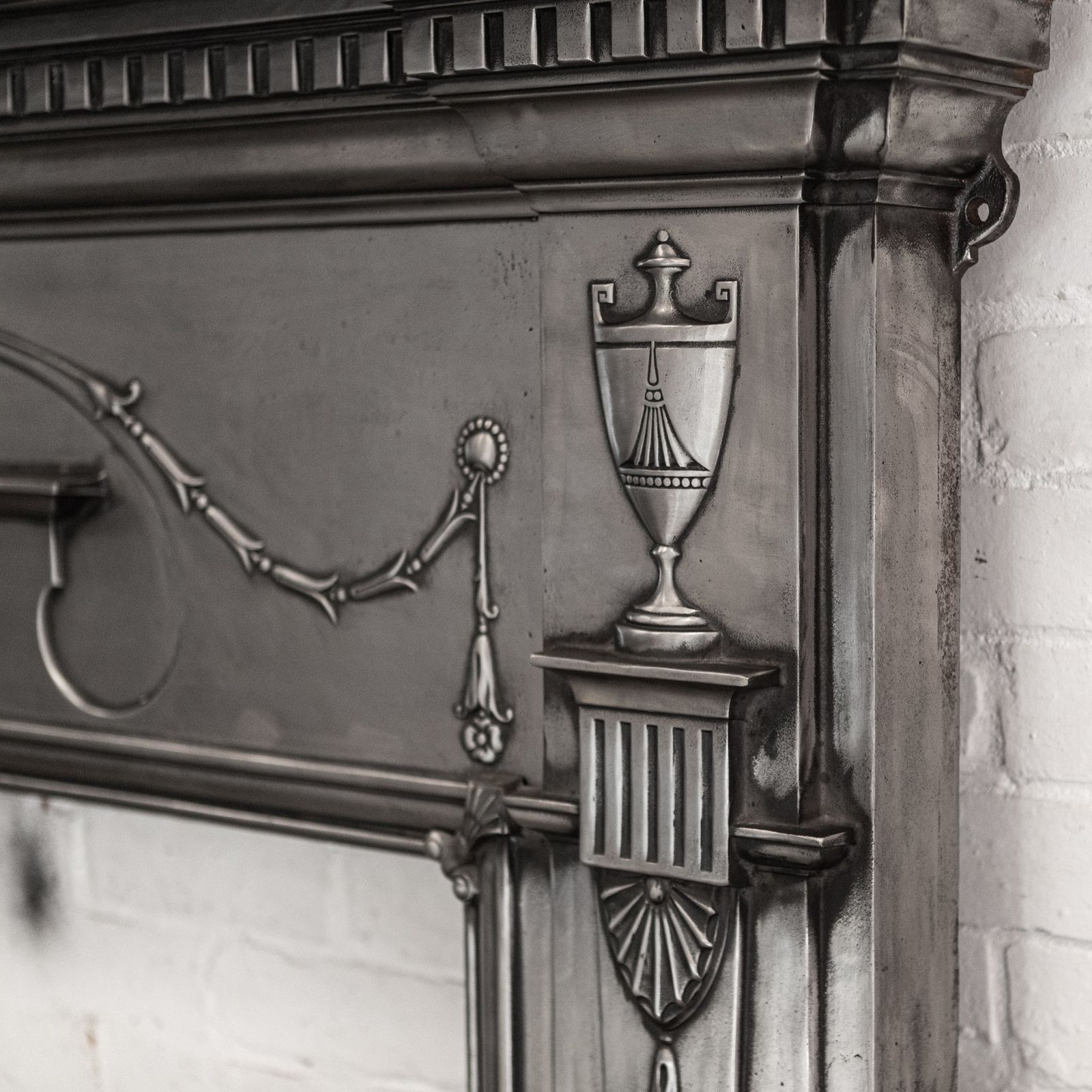 photo for sale Antique Polished Cast Iron Fireplace Surround