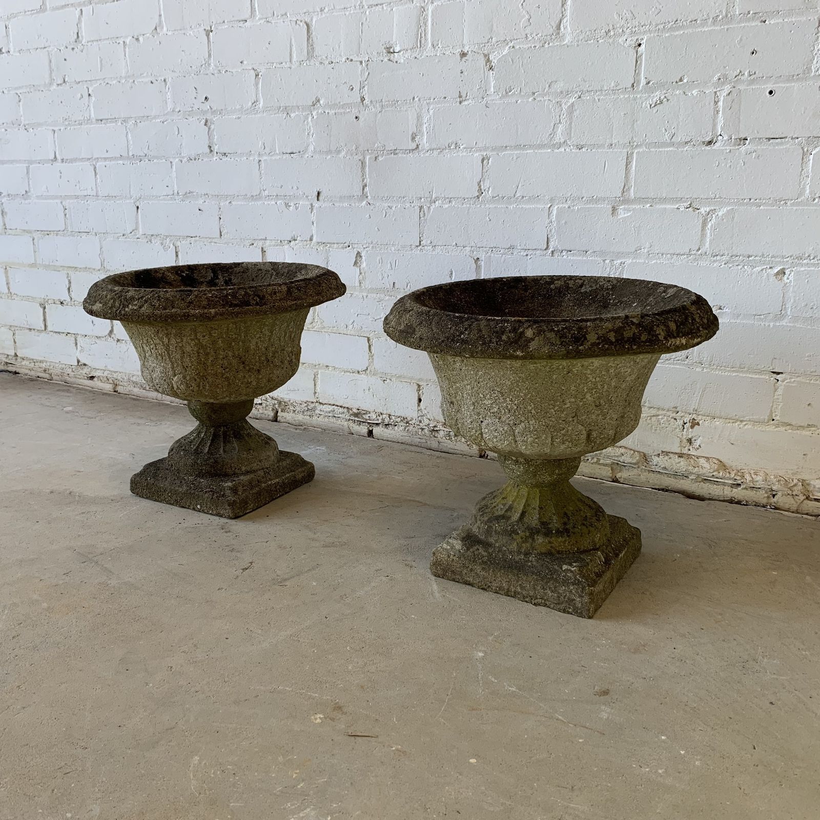 Small Pair Of Weathered Reclaimed Composition Urns