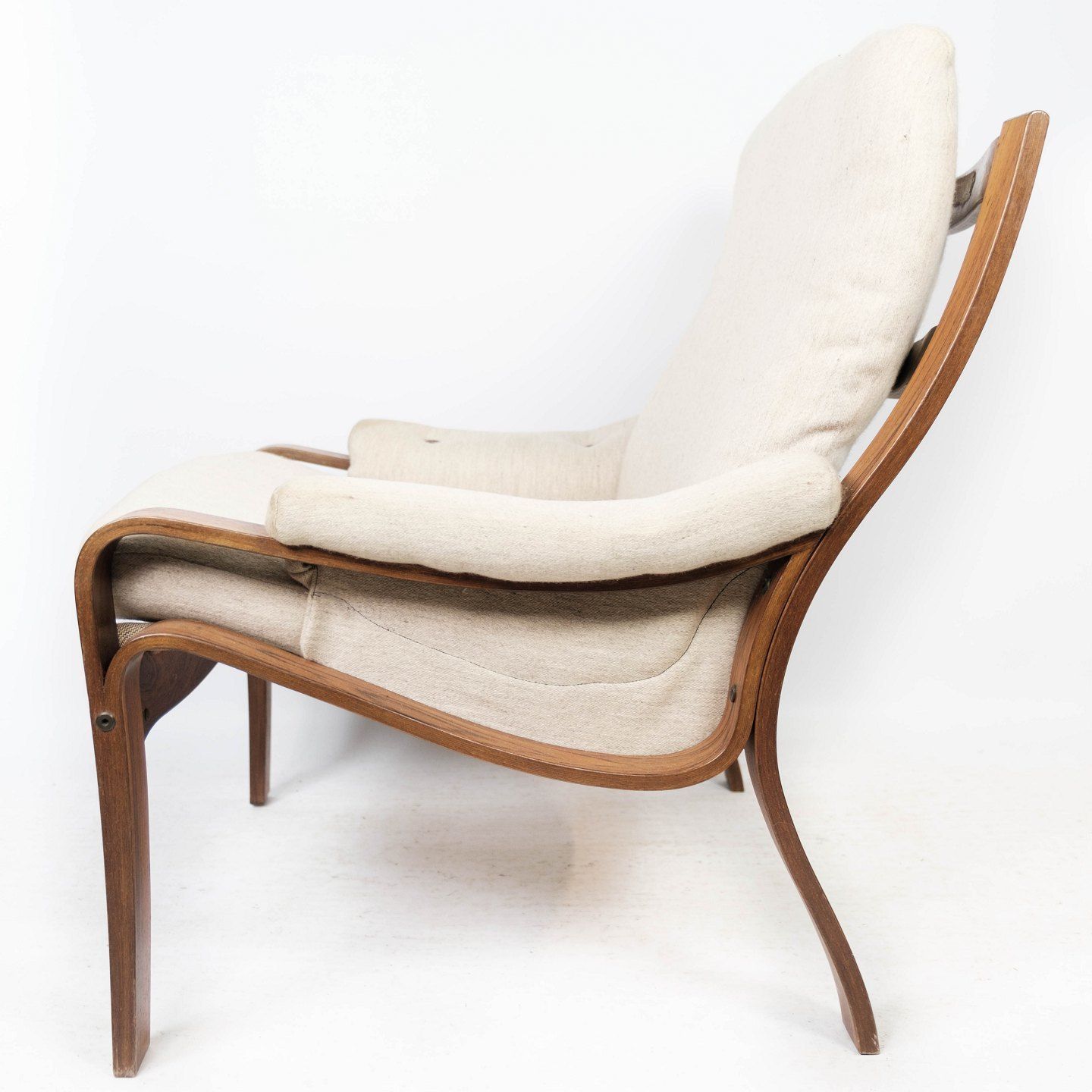 Easy Chair In Rosewood And Upholstered With Light Fabric, Of Danish Design From The 1960s. photo for sale