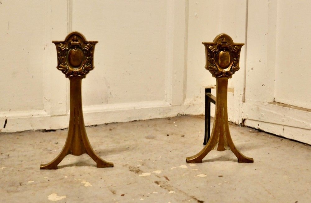 An Elegant Pair Of 19th Century Brass Andirons Or Fire Dogs