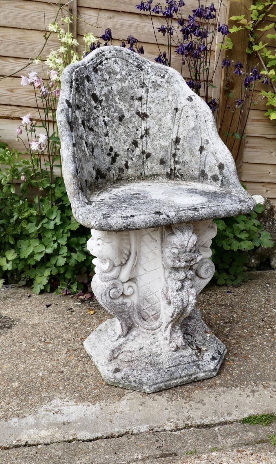 Old Weathered Garden Seat With Gargoyles photo furniture