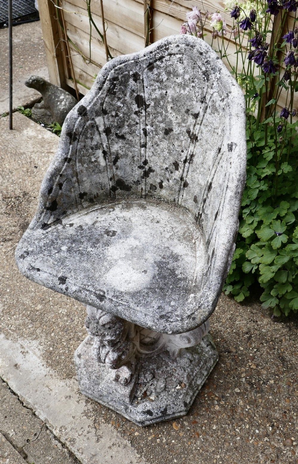 Old Weathered Garden Seat With Gargoyles photo vinterior