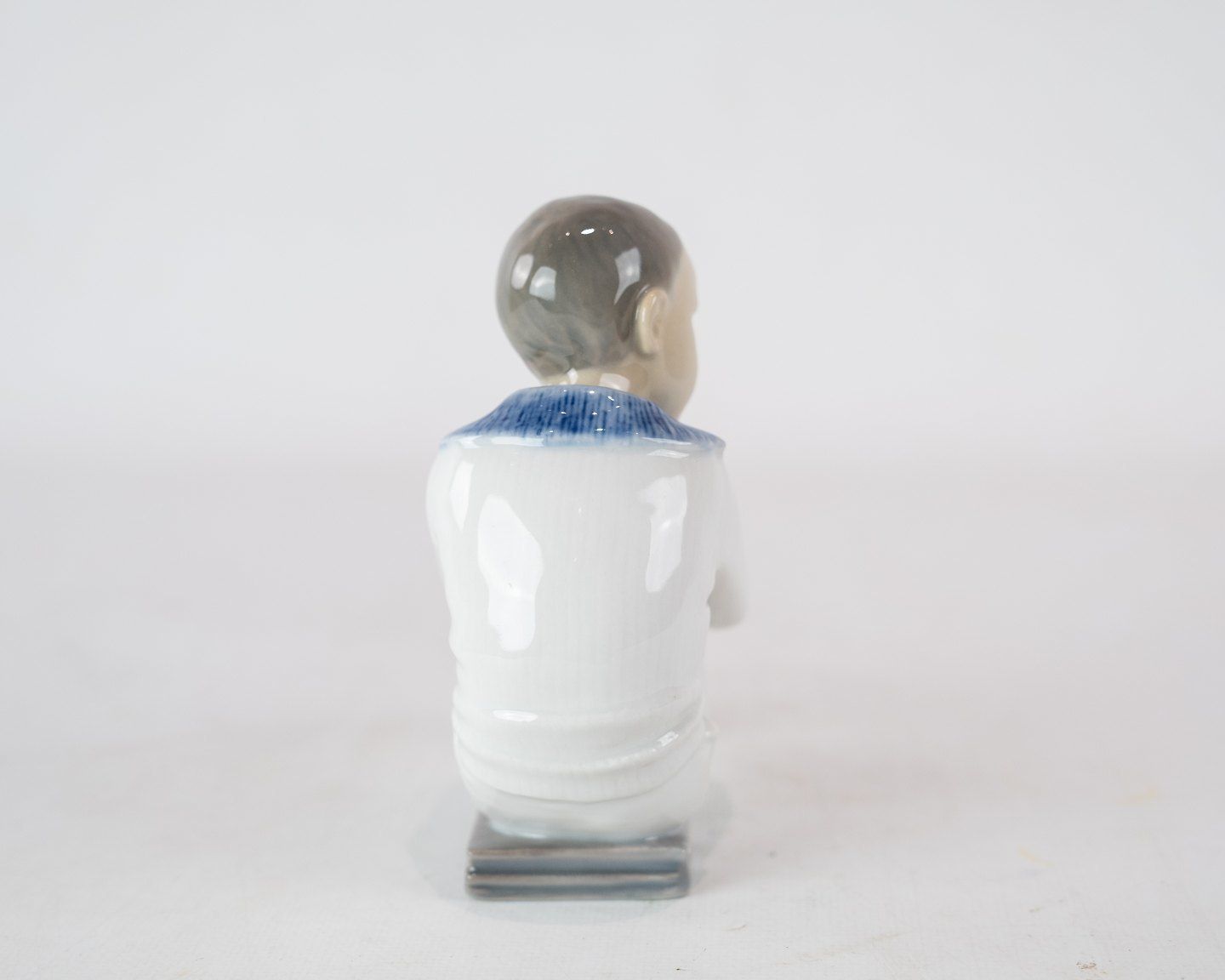 Porcelain Figure, Seated Boy, No .: 1742 By Bing And Grondahl. photo for sale