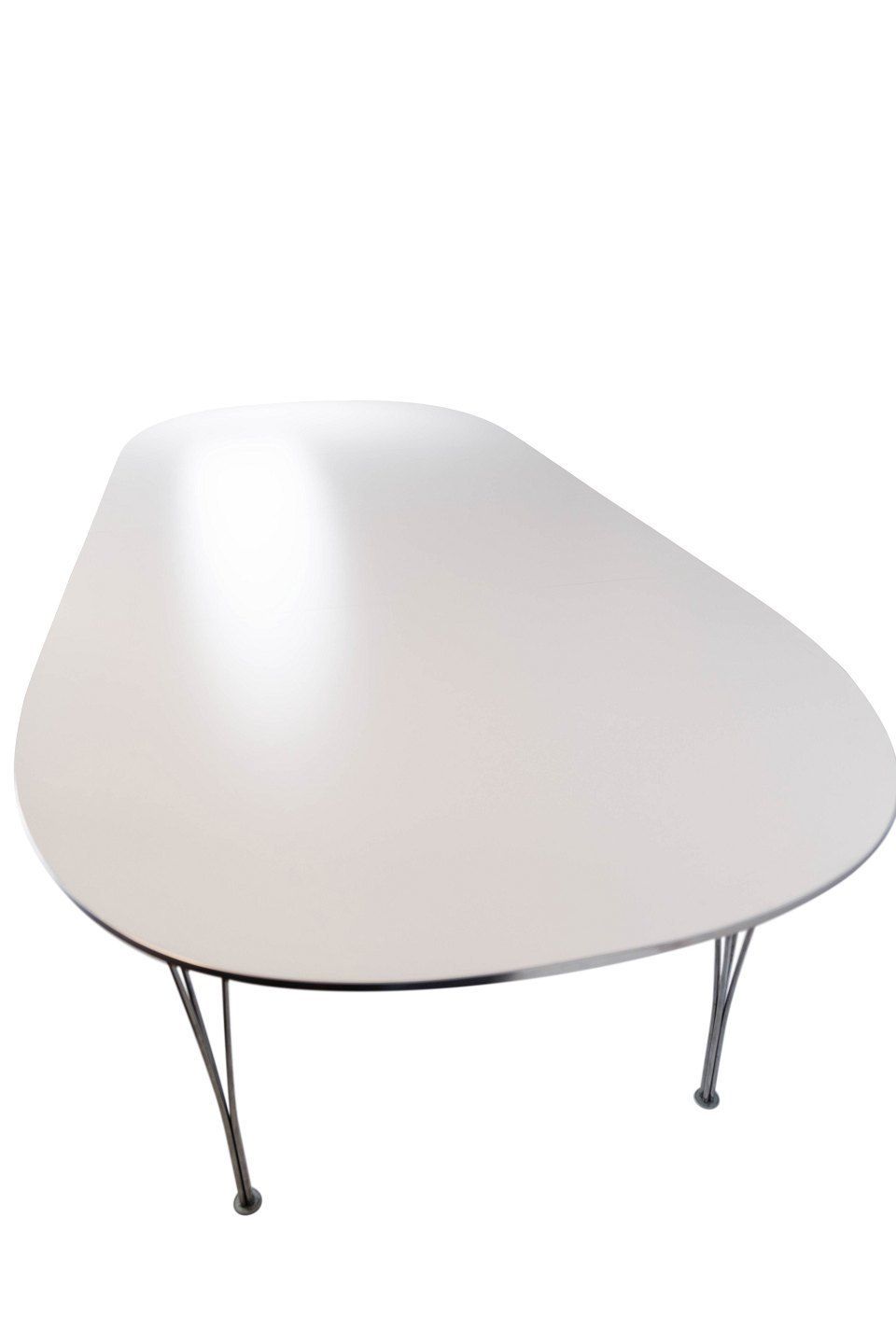 photo furniture Super Ellipse Dining Table With White Laminate Designed By Piet Hein And Arne Jacobsen, And Manufactured By Fritz Hansen In 1998.