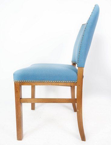 Dining Room Chair With Legs Of Light Mahogany And Upholstered With Light Blue Fabric Of Danish Design And Carpentry Work From The 1940s photo furniture