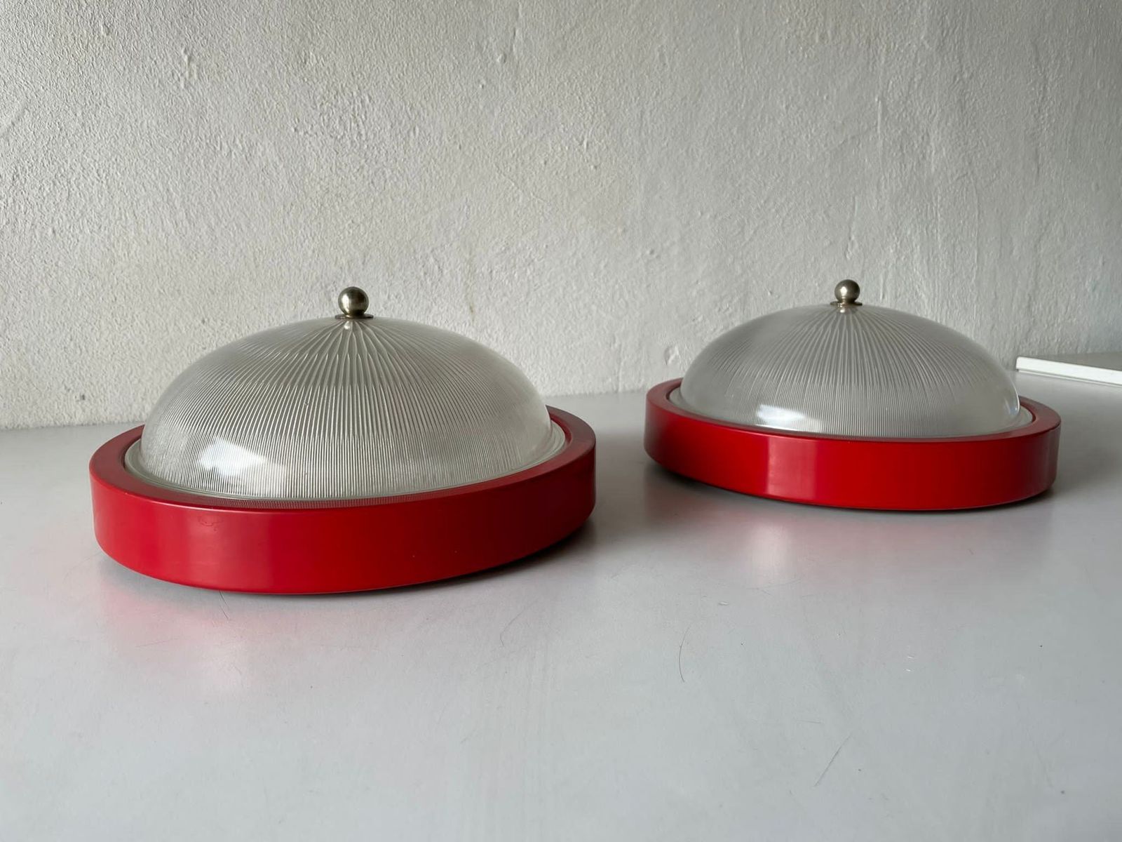 Glass And Red Metal Base Pair Of Sconces Or Ceiling Lamps By Reggiani, 1970s, Italy