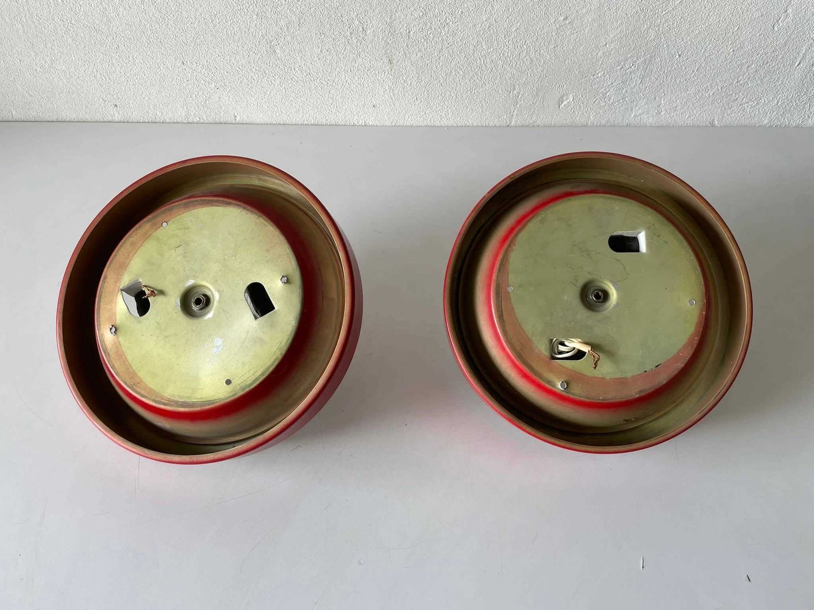 photo for sale Glass And Red Metal Base Pair Of Sconces Or Ceiling Lamps By Reggiani, 1970s, Italy