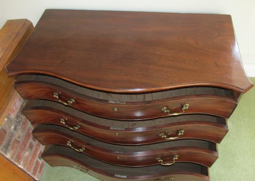photo for sale Fine Serpentine Mahogany Chest Of Drawers