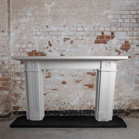 18th Century Georgian Marble Bulls Eye Fireplace.