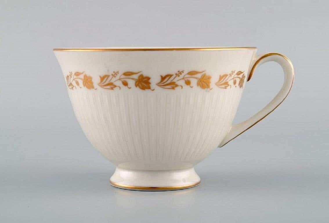 Royal Doulton, England, Twelve Fairfax Teacups With Saucers And A Cream Jug photo for sale