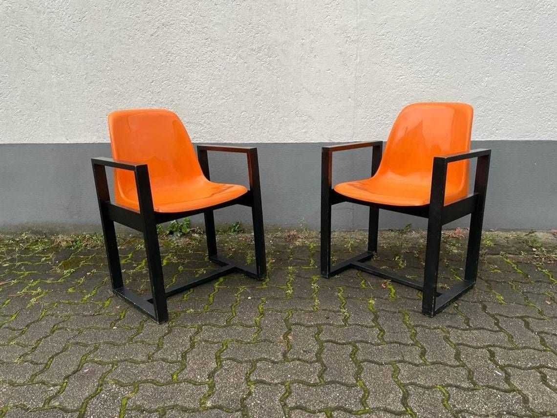 Titlespace Age Orange Plastic Seat And Wood Frame Pair Of Chairs By Möbel Mann 1960s Germany