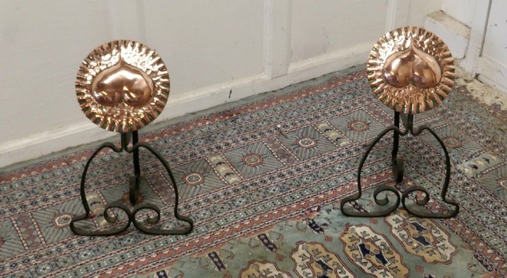 A Pair Of Arts And Crafts Copper And Iron Andirons Or Fire Dogs photo for sale