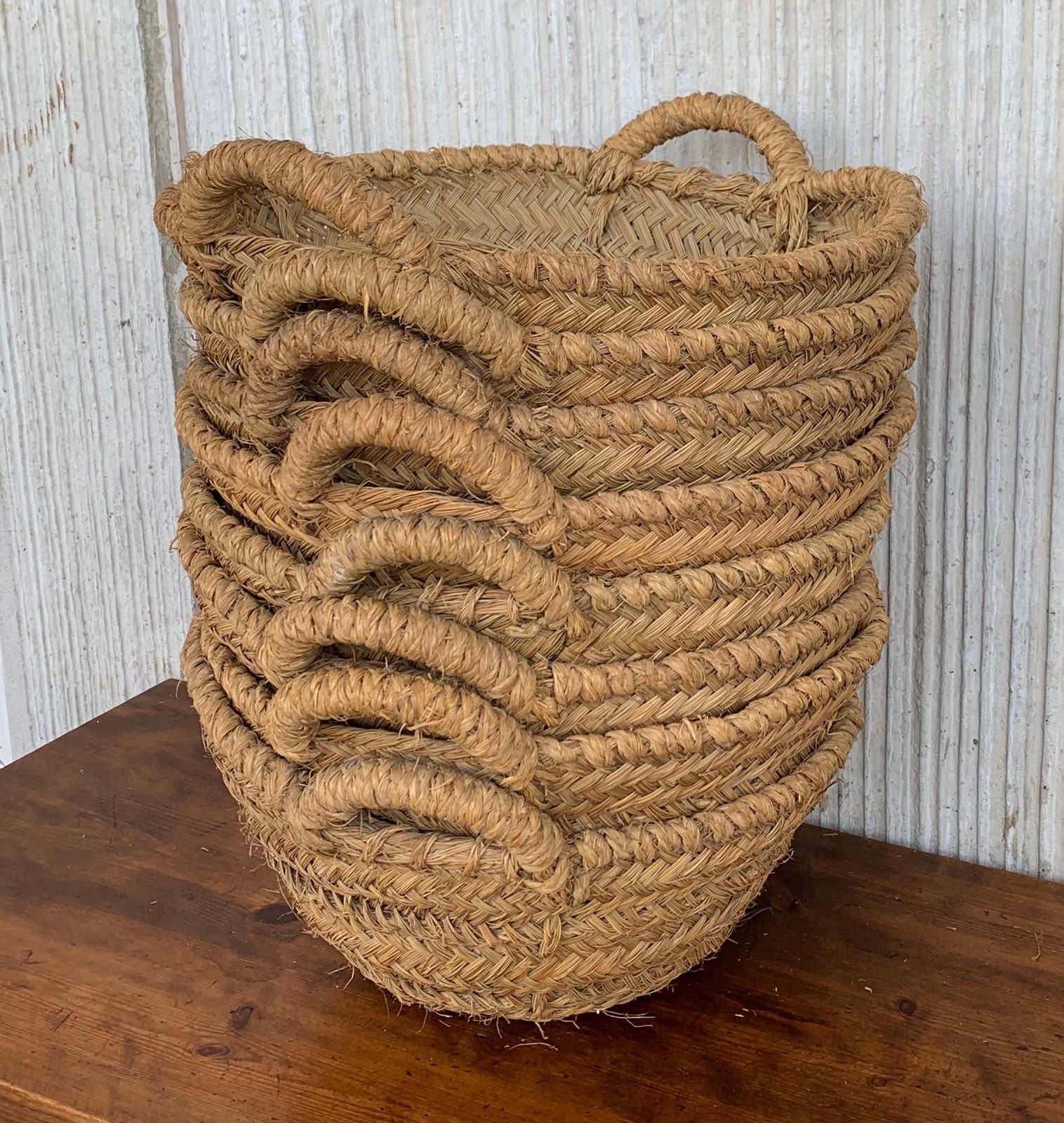 photo furniture Set Of 8 Spanish Woven Wicker Olive Grape Harvest Basket