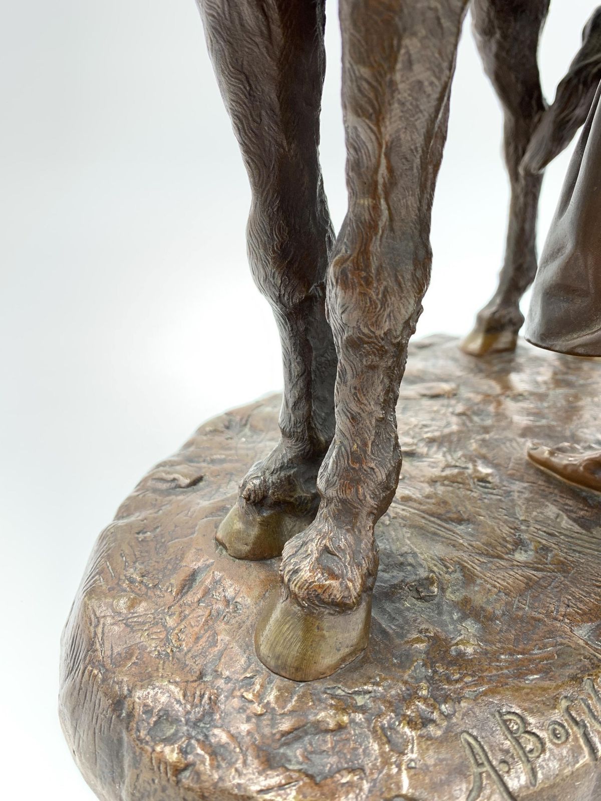 photo vintage A French Patinated Bronze Group Of A Figure And Donkey, Entitled 'Anier Du Caire'