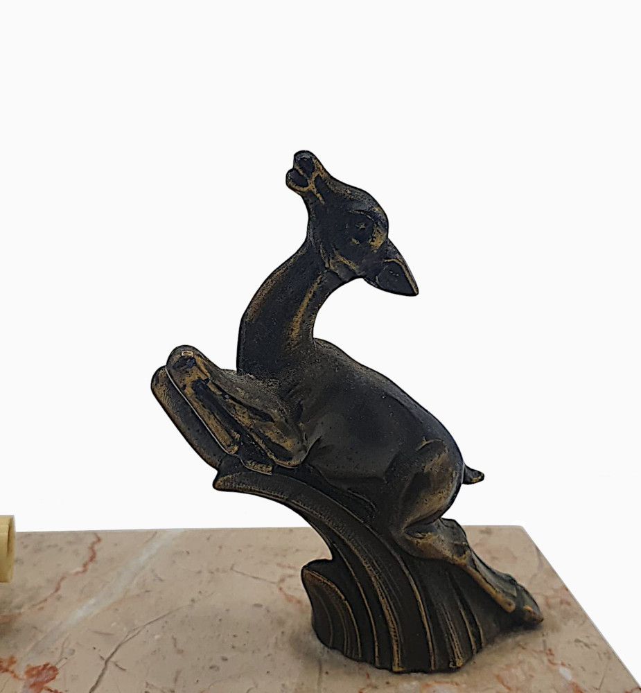 A Lovely French Art Deco Perpetual Desk Calendar With A Bronze Leaping Deer photo furniture