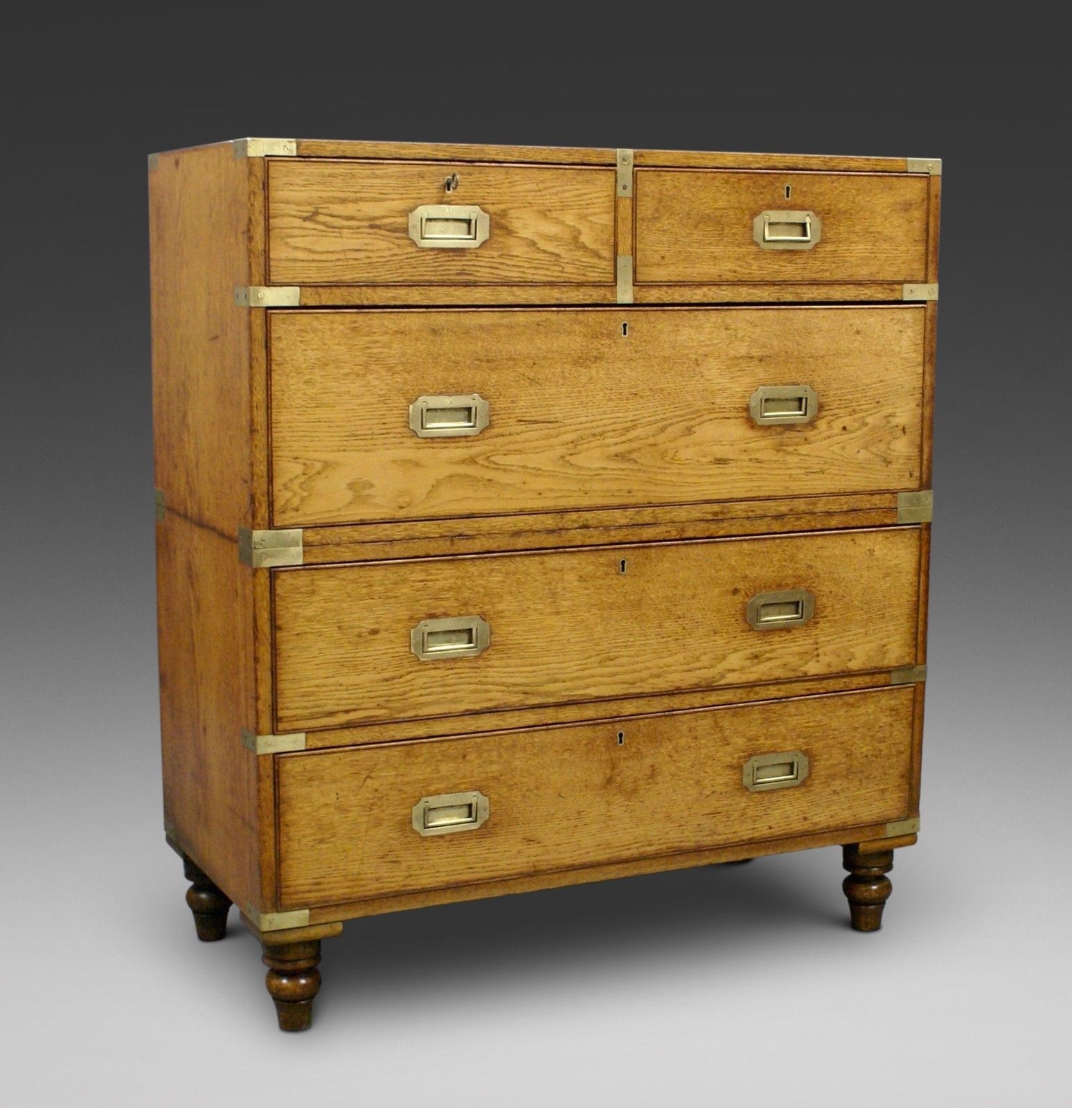 An Oak Military Or Campaign Chest Of Drawers