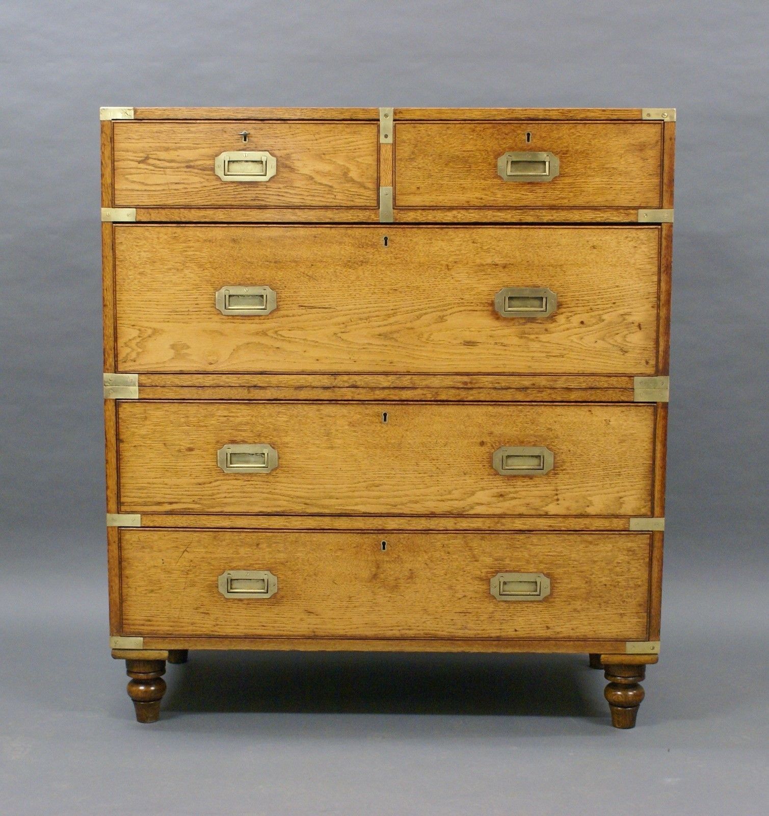 An Oak Military Or Campaign Chest Of Drawers photo furniture