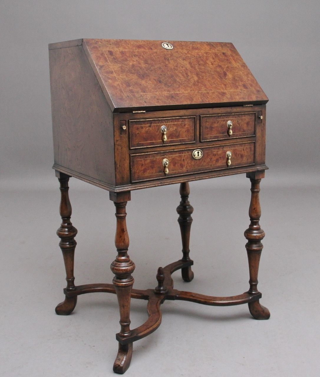 Early 20th Century Walnut And Elm Bureau In The Queen Anne Style
