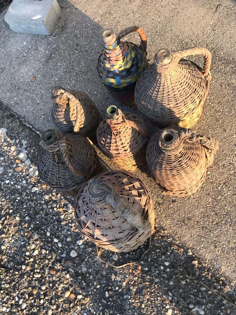 Set Of Seven Midcentury Vintner Woven Baskets With Demijohn Wine Bottles photo for sale
