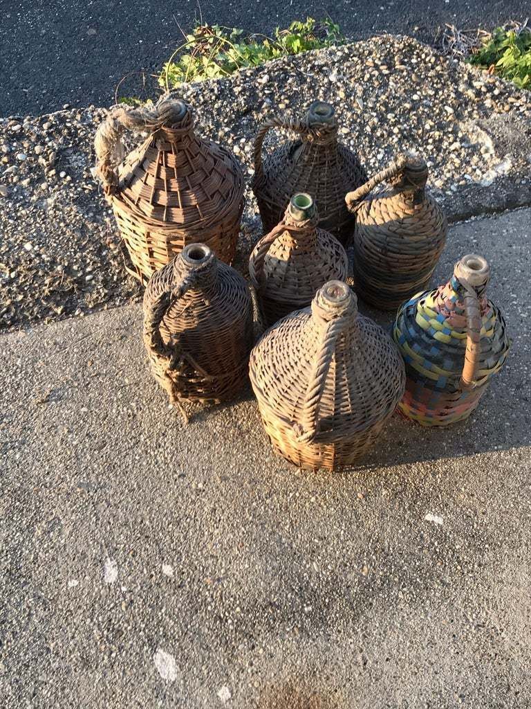 Set Of Seven Midcentury Vintner Woven Baskets With Demijohn Wine Bottles photo Home Decor
