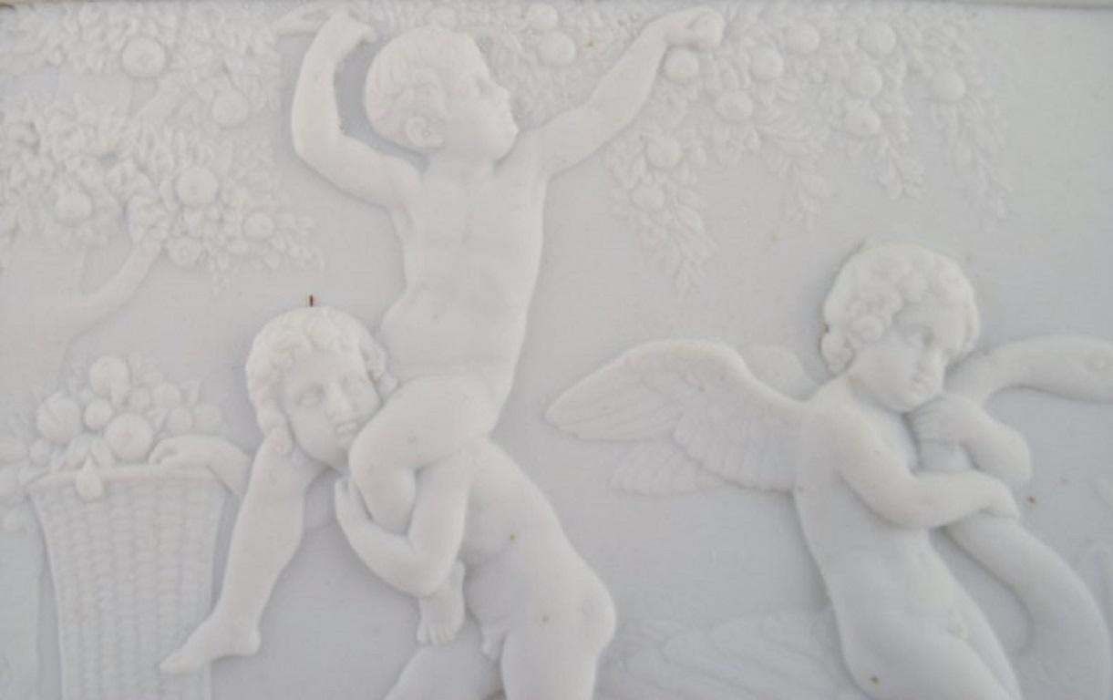 Bing And Grøndahl After Thorvaldsen, Antique Biscuit Wall Plaque With Putti photo furniture
