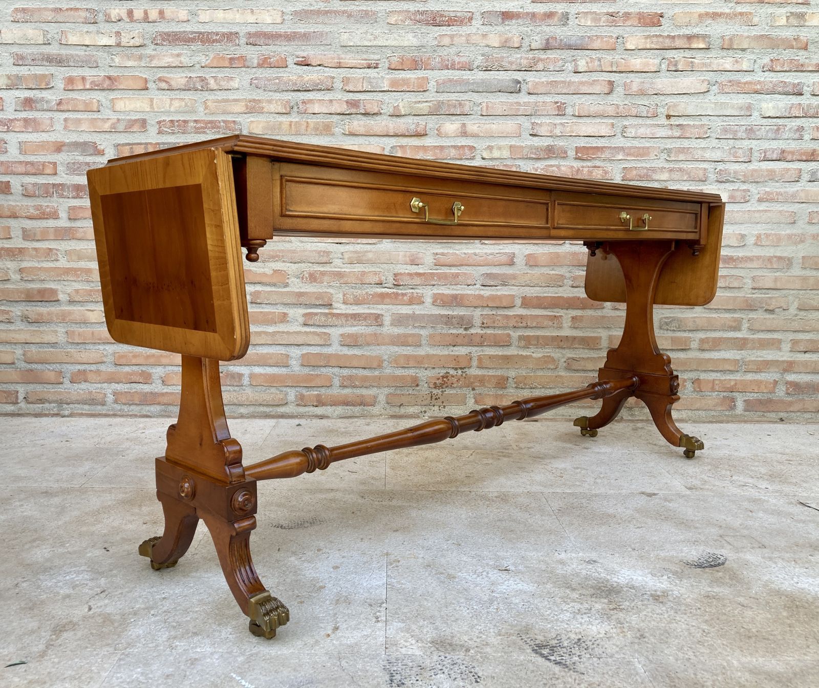 3840.0 Mid 20th Century Winged Console Table In Walnut With Claw Feet In Bronze, Two Drawers And Wheels photo