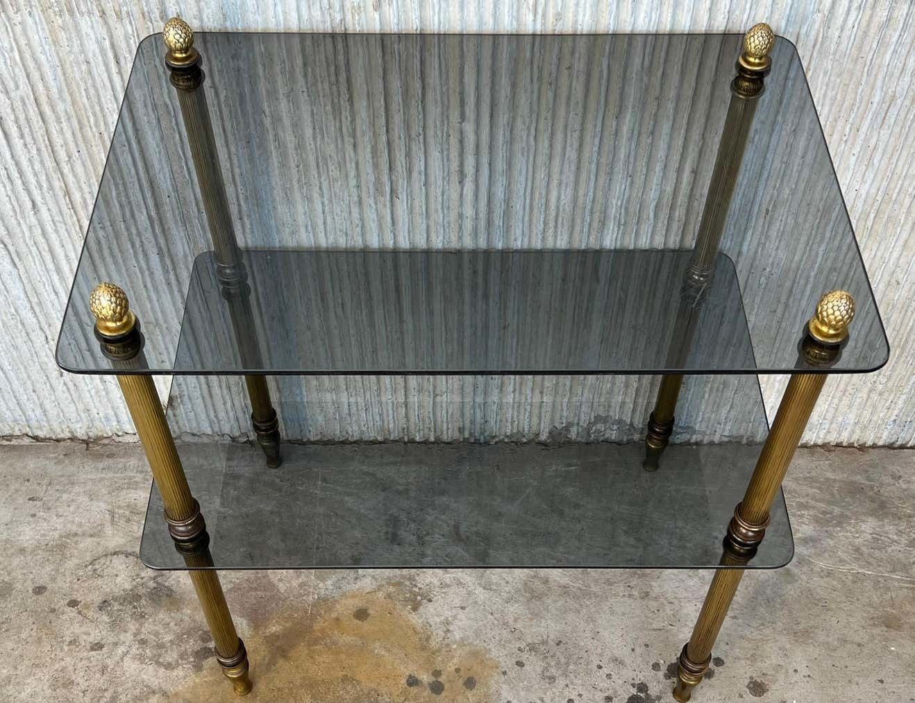 photo furniture Table basse Hollywood Regency en bronze avec plateau en verre fumé, début du XXe siècle