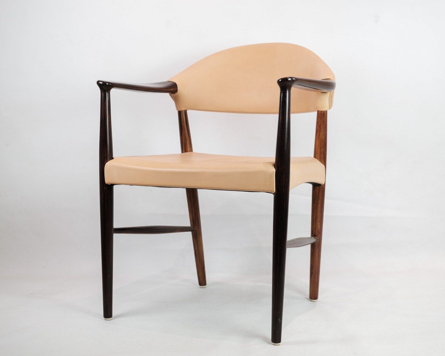 Armchair In Rosewood With Light Natural Leather Designed By Kurt Olsen In The 1960s photo furniture