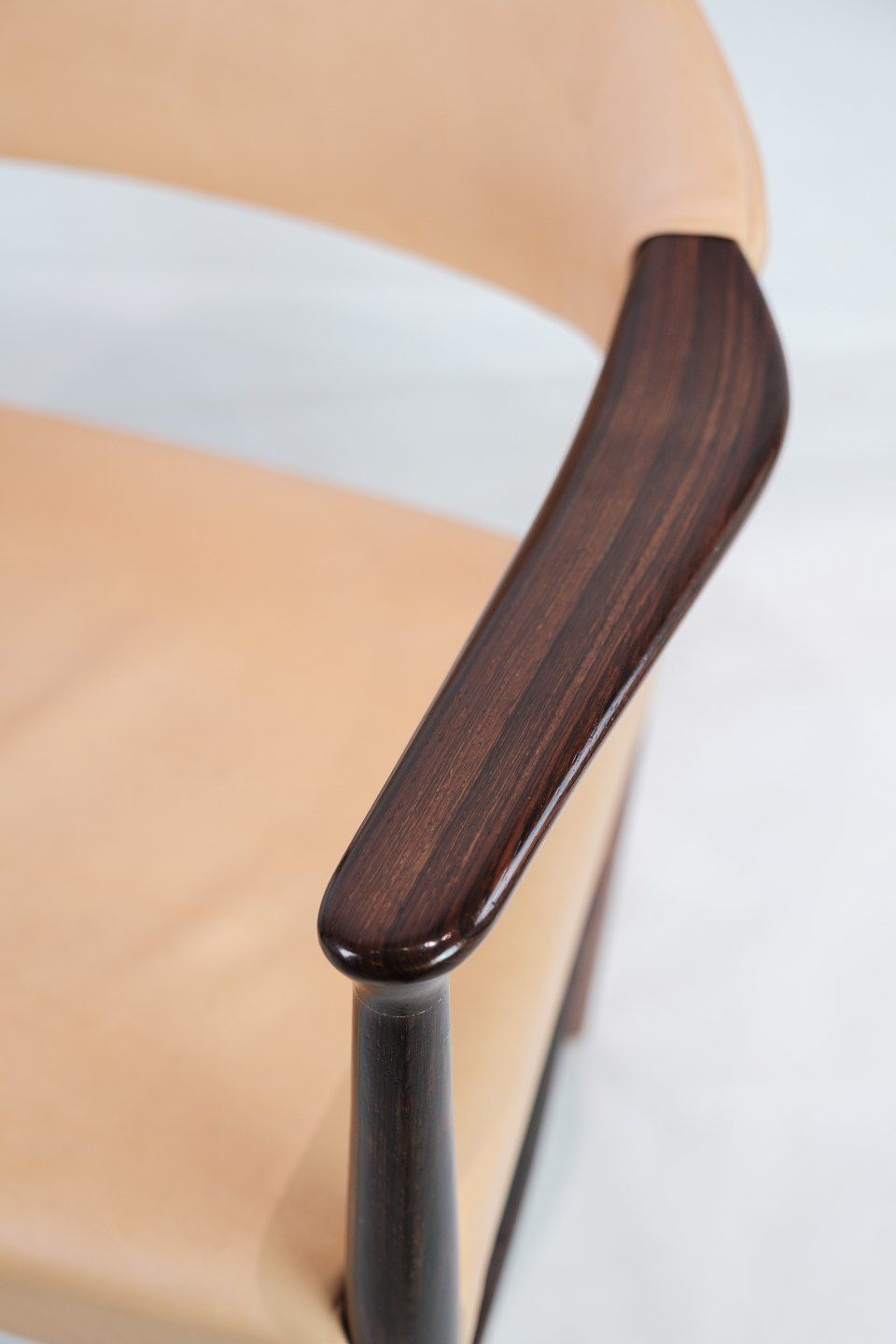photo furniture Armchair In Rosewood With Light Natural Leather Designed By Kurt Olsen In The 1960s