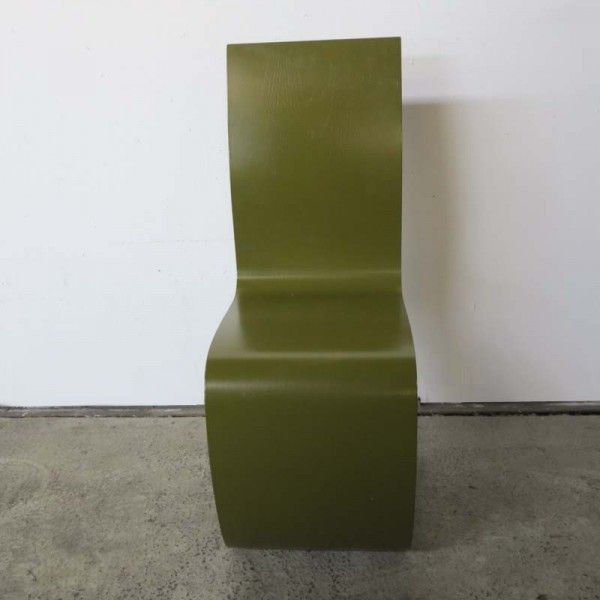 photo furniture Four Vintage Wooden Chairs In The Form Of S. 1960   1970