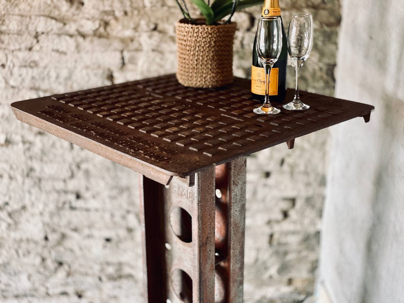 Dino Reclaimed Manhole Bar Table With A Heavy Steel Pedestal Base photo furniture
